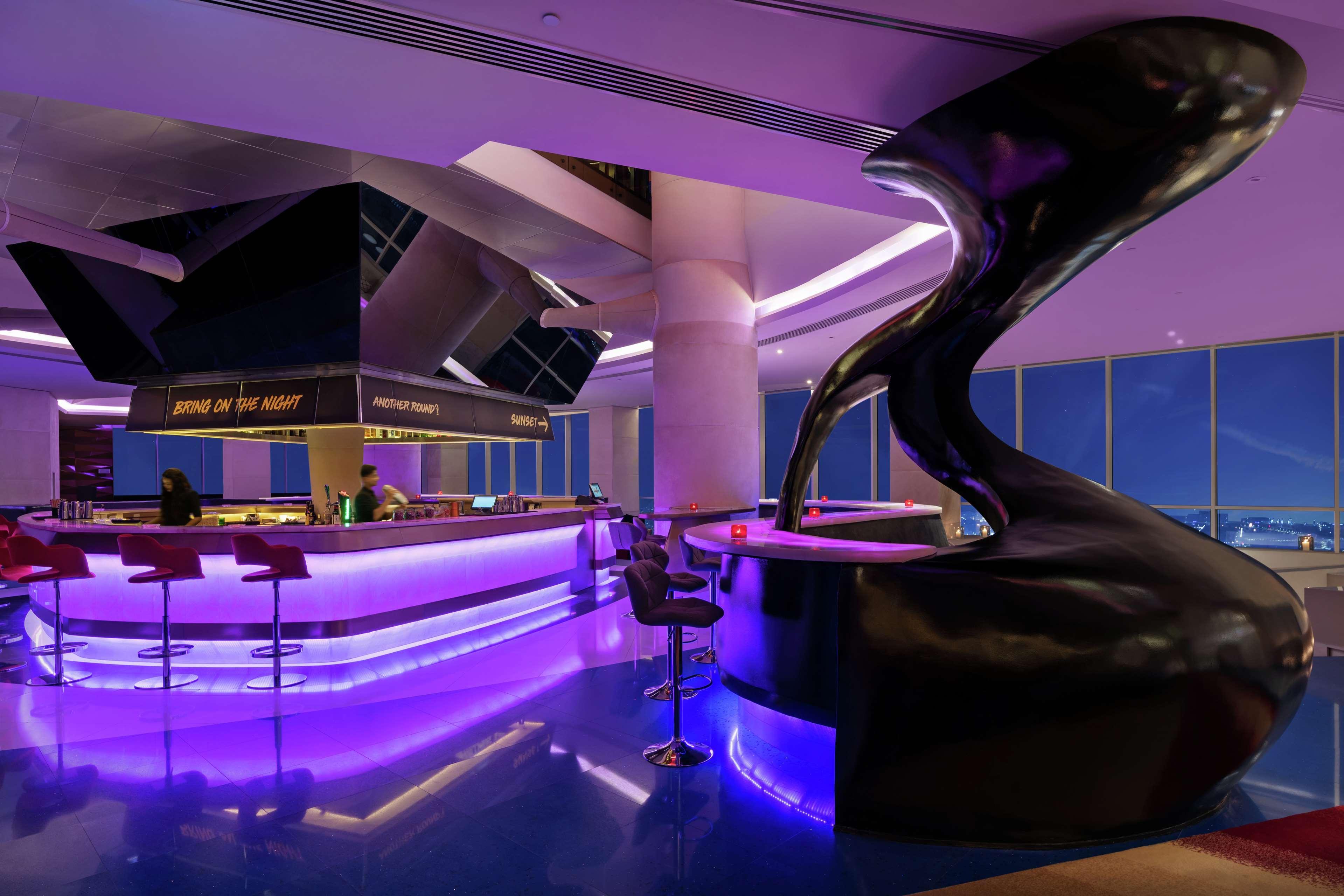 V Hotel Dubai, Curio Collection By Hilton Экстерьер фото The bar at the 101 Skybar