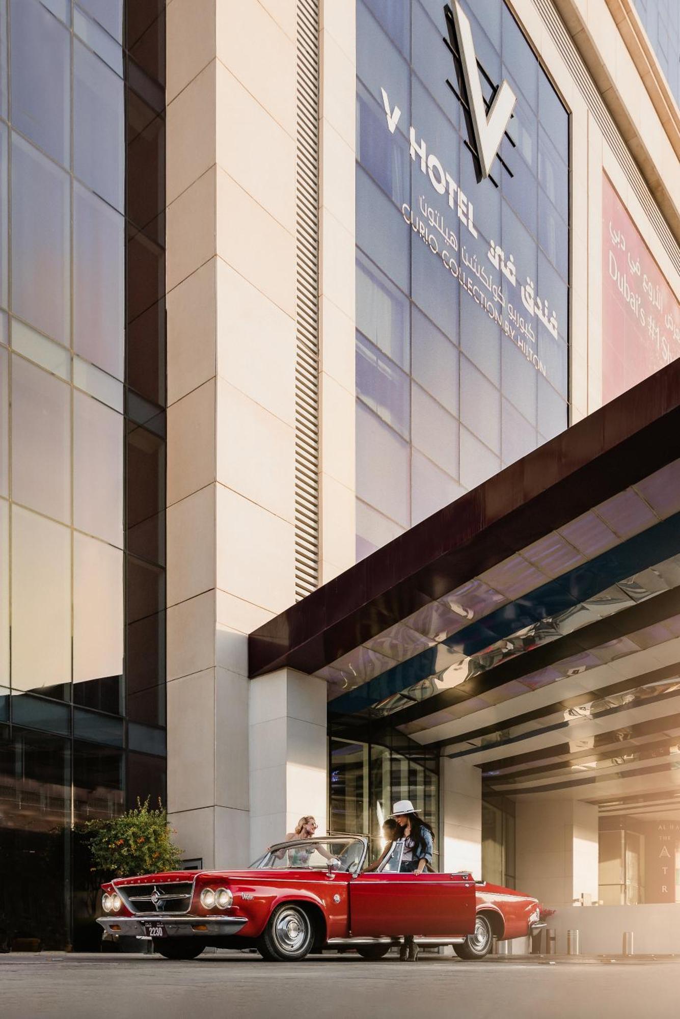 V Hotel Dubai, Curio Collection By Hilton Экстерьер фото The exterior of the building
