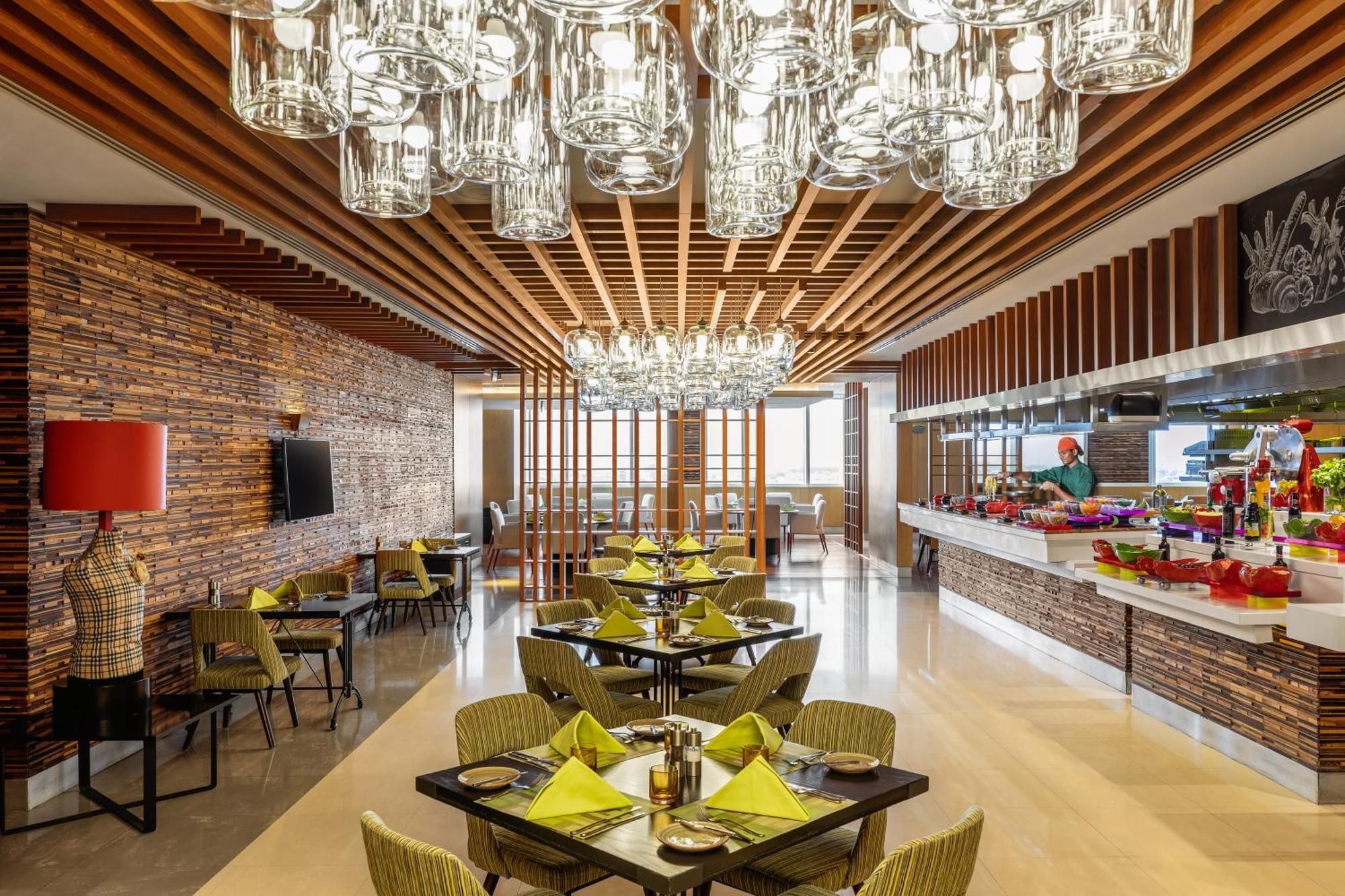 V Hotel Dubai, Curio Collection By Hilton Экстерьер фото The restaurant