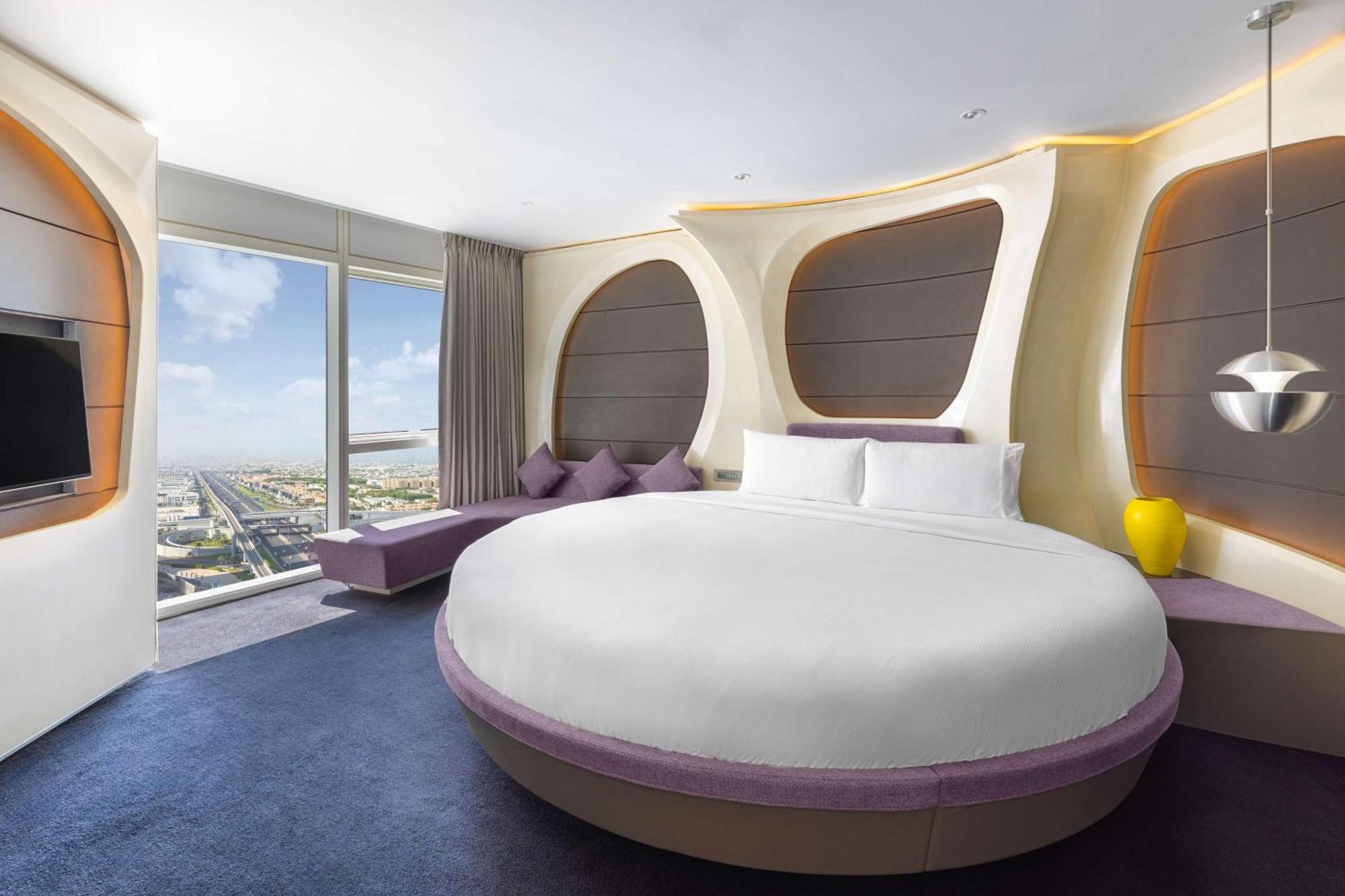V Hotel Dubai, Curio Collection By Hilton Экстерьер фото A bedroom at the hotel