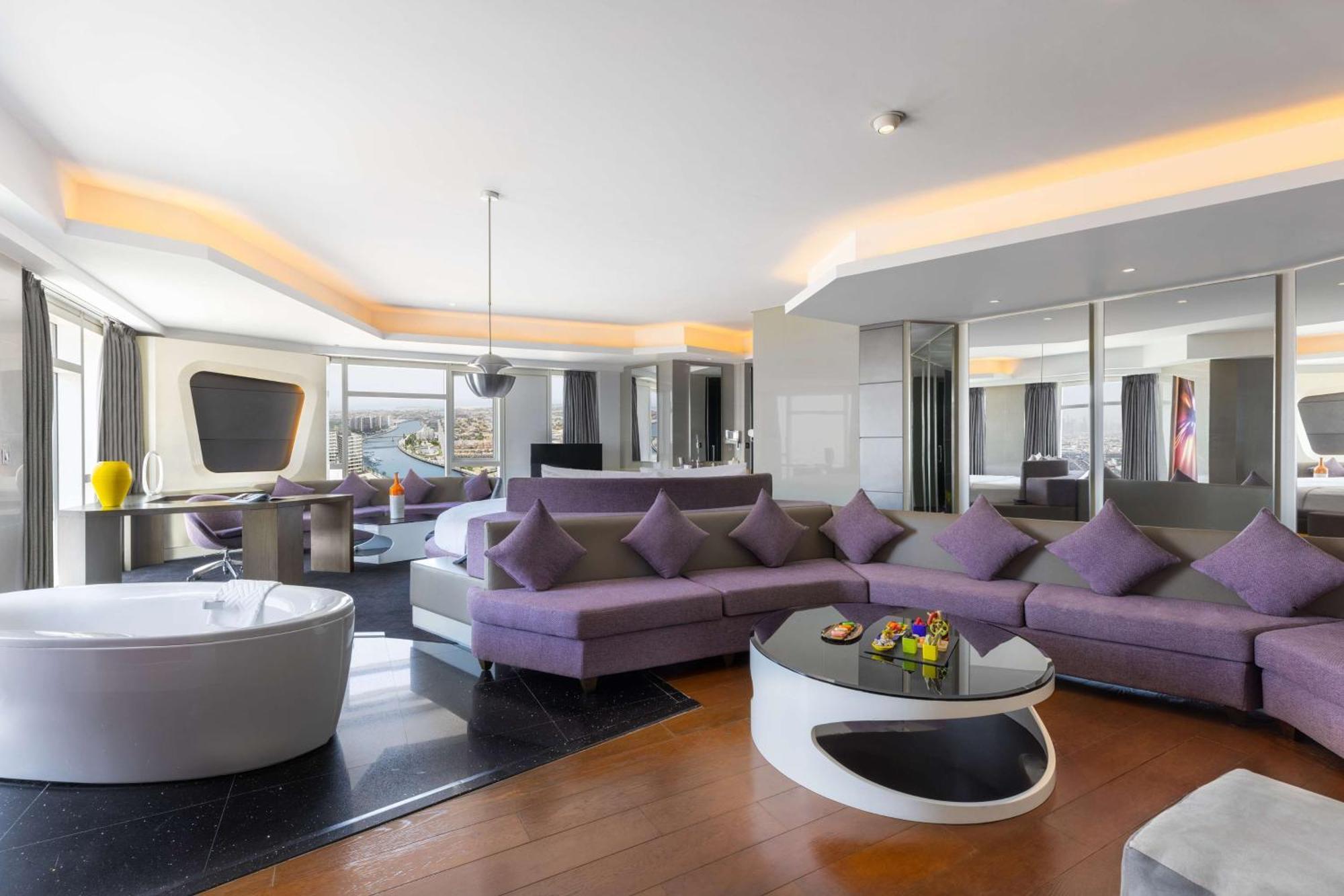 V Hotel Dubai, Curio Collection By Hilton Экстерьер фото A suite at the hotel