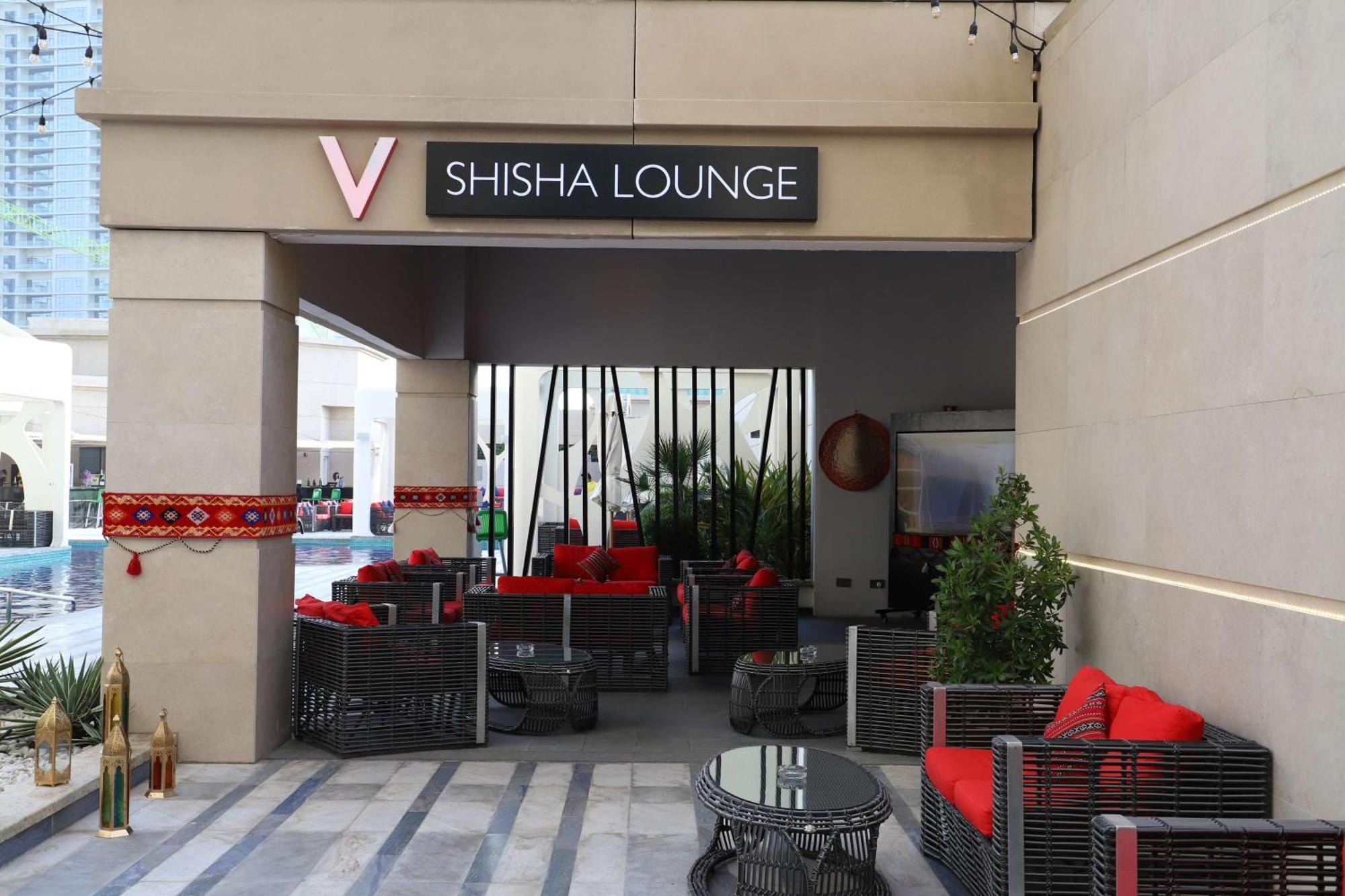 V Hotel Dubai, Curio Collection By Hilton Экстерьер фото A shisha lounge in Dubai